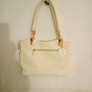 Cream Shoulder Bag with Gold Accents and Textured  MiaK Collection.
